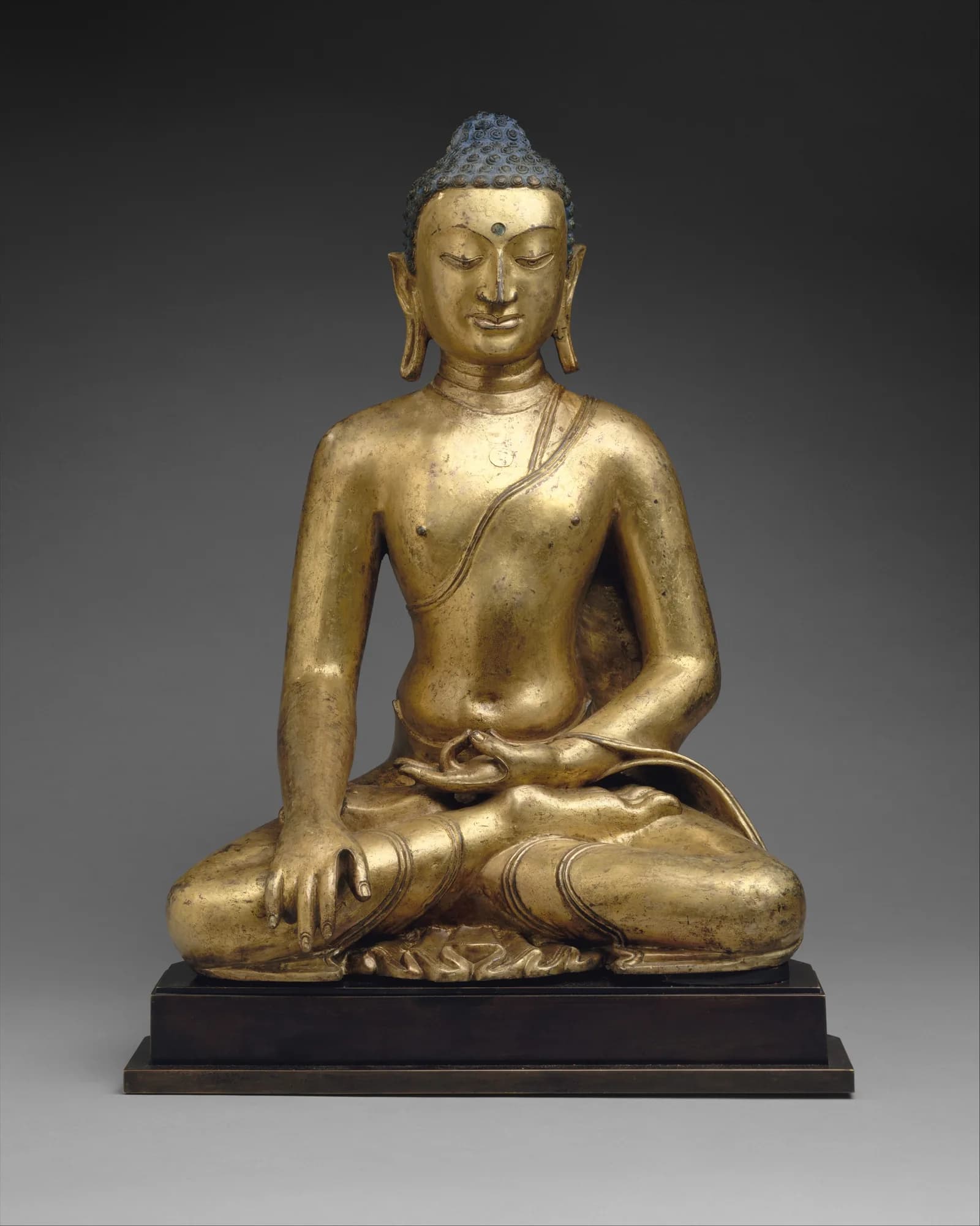 Buddha Shakyamuni or Akshobhya, the Buddha of the East — Tibet, 11th–12th century. Museum reference image standing in for Six-Armed Mahakala.
